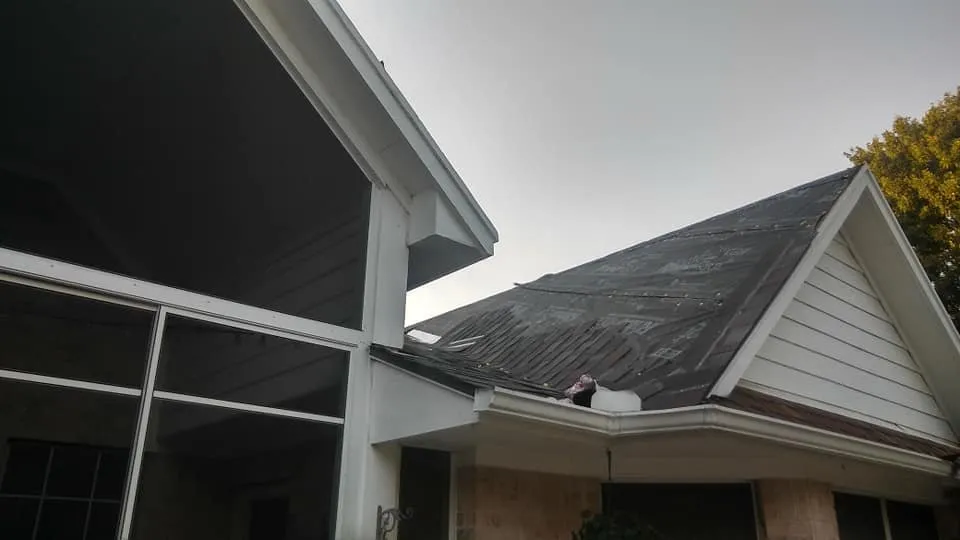 Slide of Junior Roofing & Repair