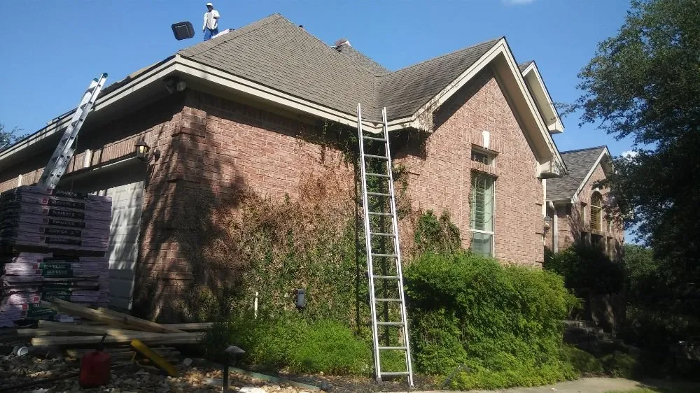 Slide of Junior Roofing & Repair