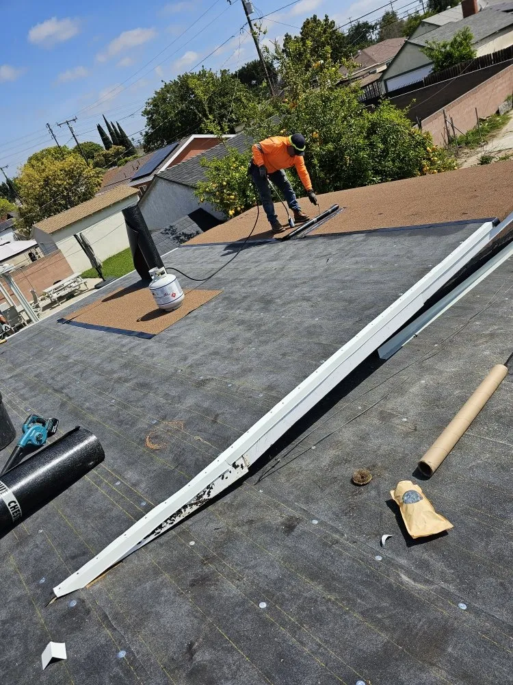 Slide of Juniors Roofing