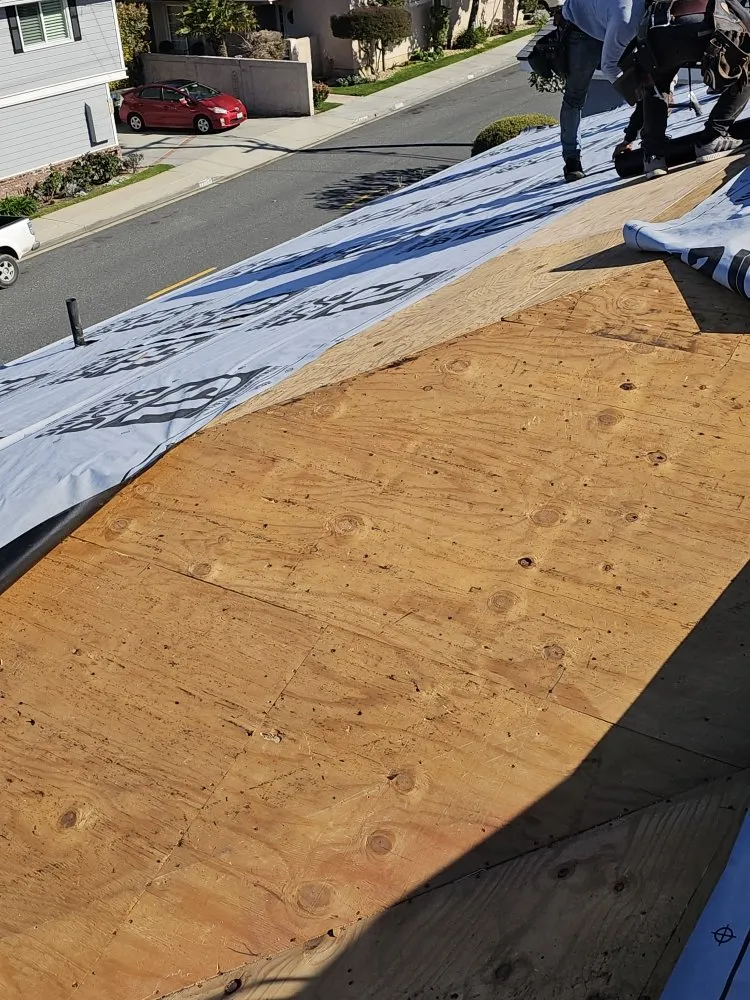 Slide of Juniors Roofing