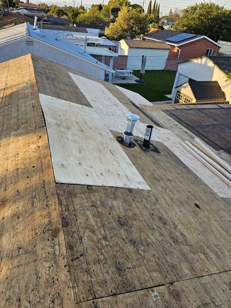 Slide of Juniors Roofing