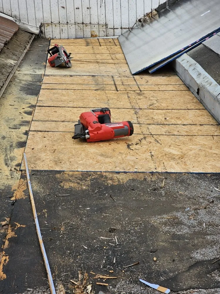 Slide of Juniors Roofing