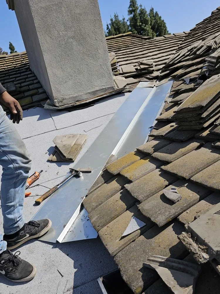 Slide of Juniors Roofing