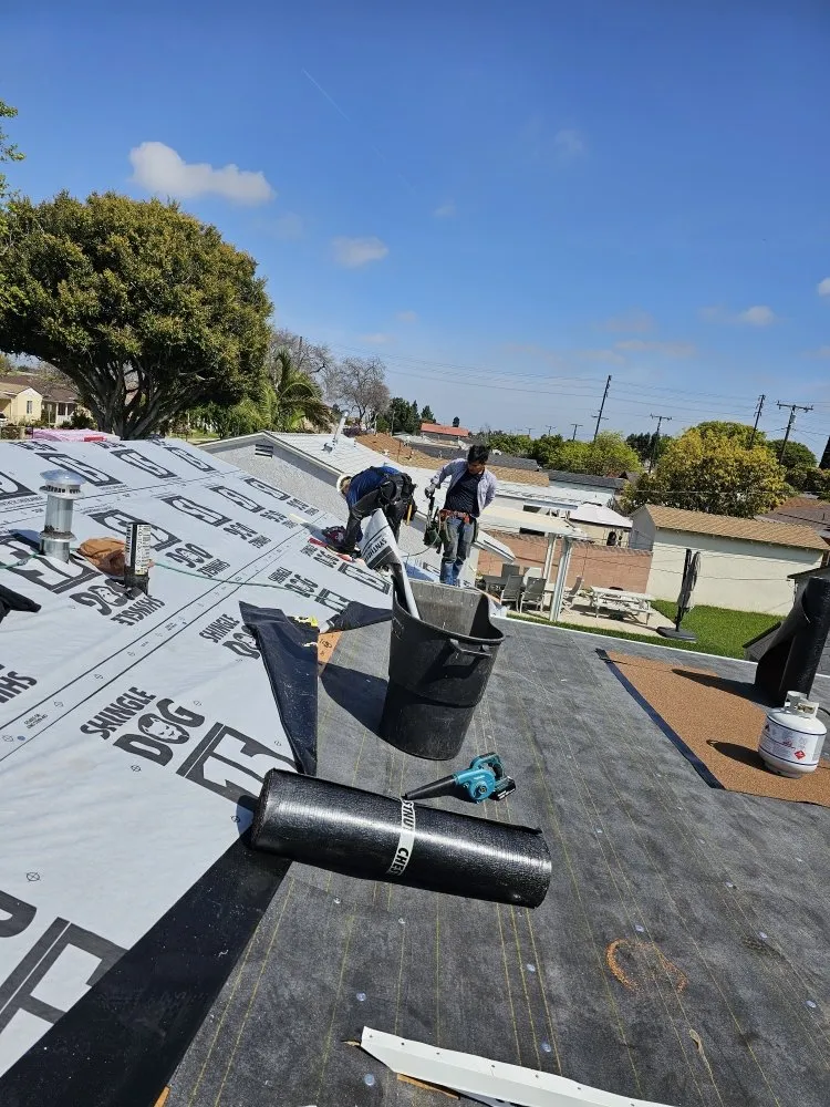 Slide of Juniors Roofing