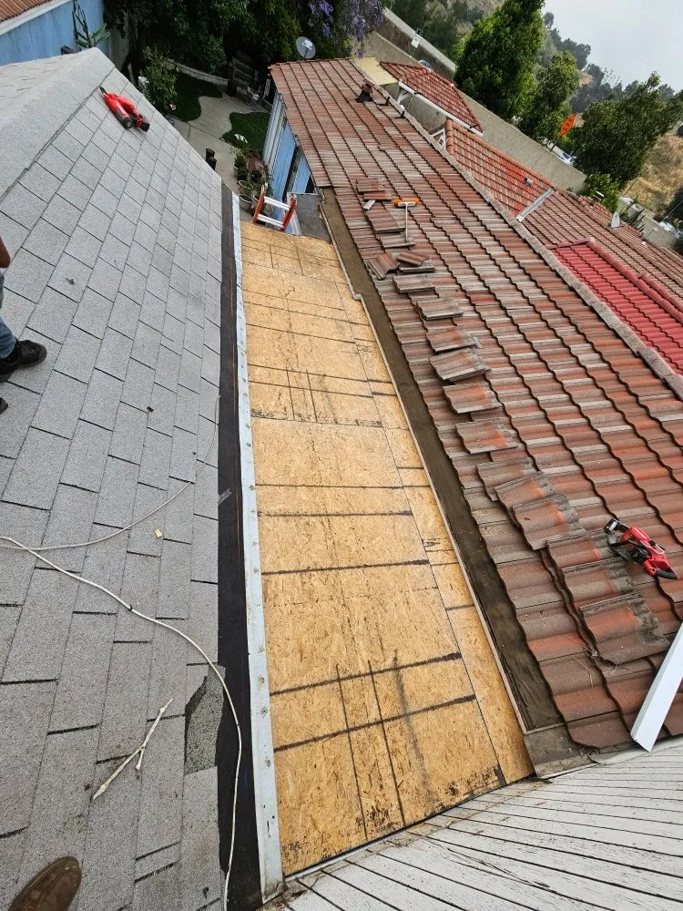 Slide of Juniors Roofing