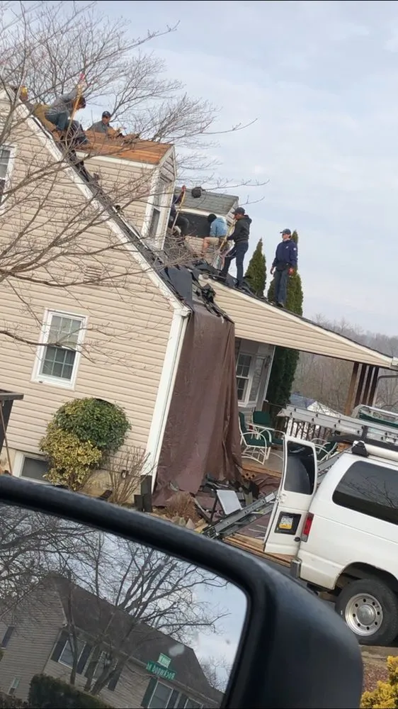 Local shingle roofing service after storm damage in Newtown Square, PA by Just Improvements Roofing & Siding