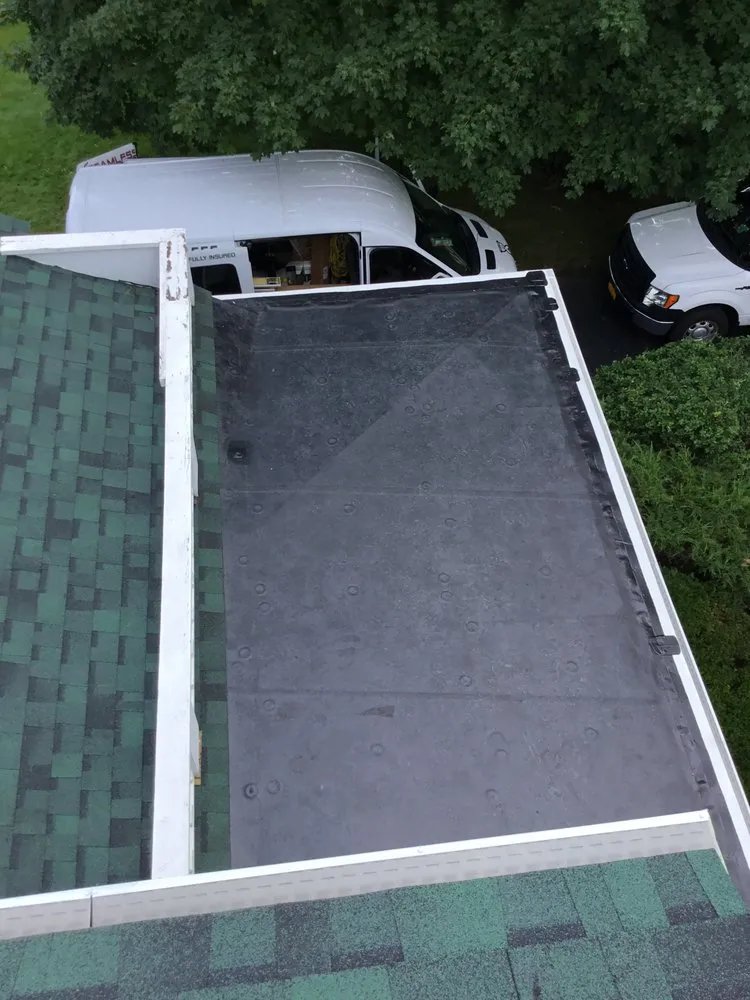 Slide of Just In Time Roofing And Gutters