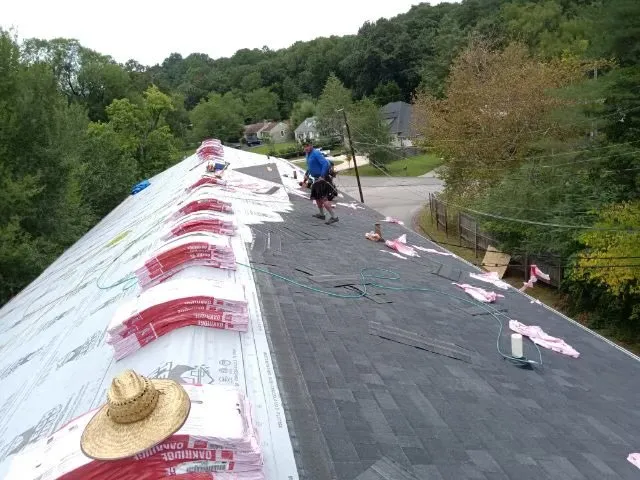 Slide of Just Roof It