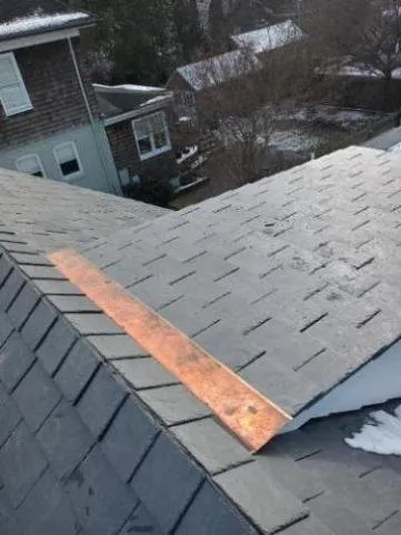 Slide of Just Roofing