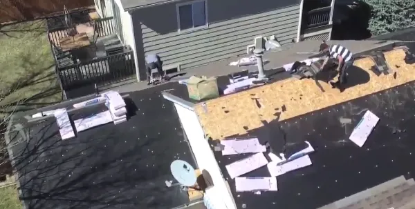 Slide of Justice Roofing