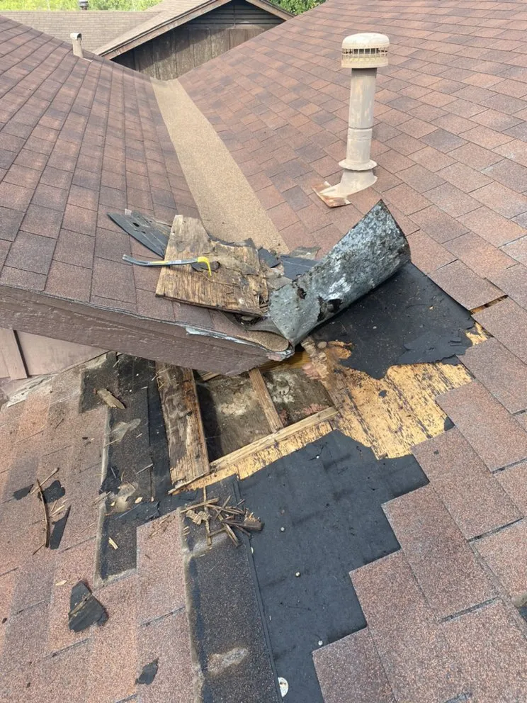Slide of JV Roofing Repair