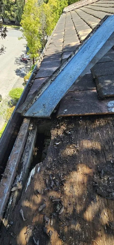 Slide of J&V Roofing Service