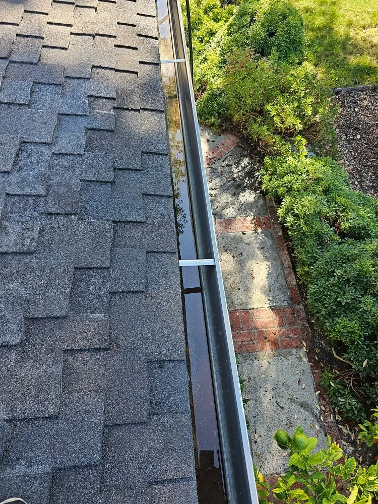 Slide of J&V Roofing Service