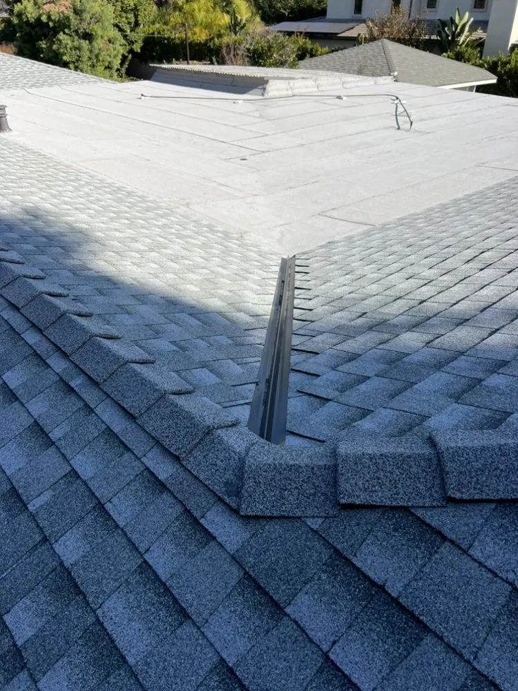 Slide of JVR Quality Roofing