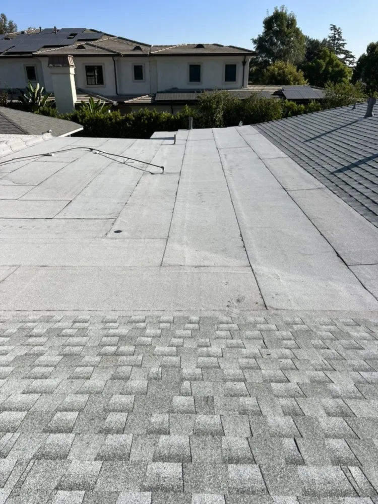 Slide of JVR Quality Roofing