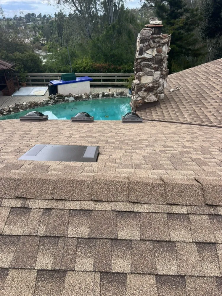 Slide of JVR Quality Roofing