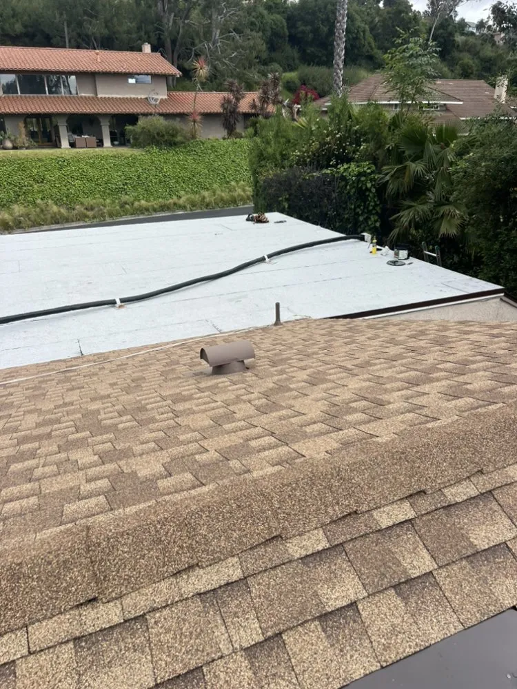 Slide of JVR Quality Roofing