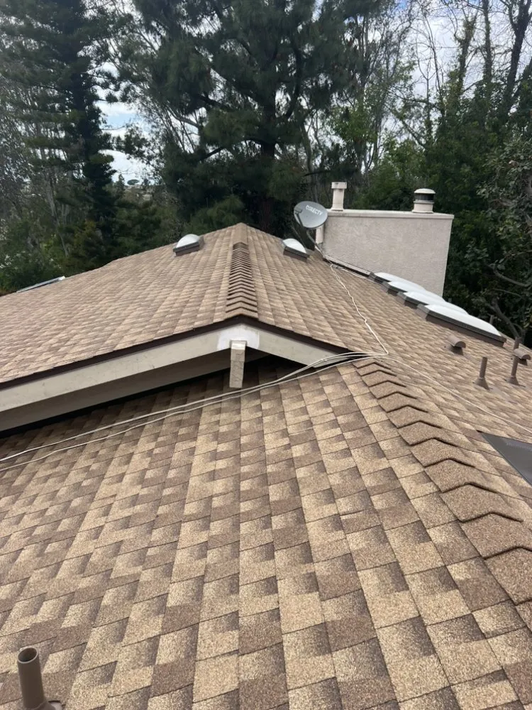 Slide of JVR Quality Roofing