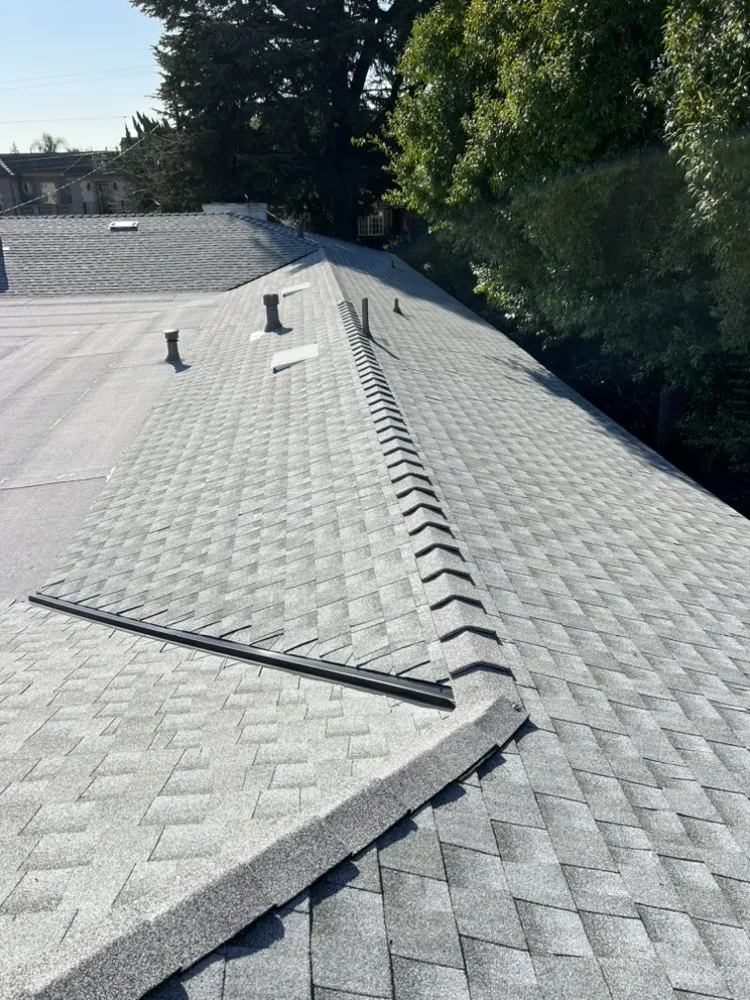 Slide of JVR Quality Roofing