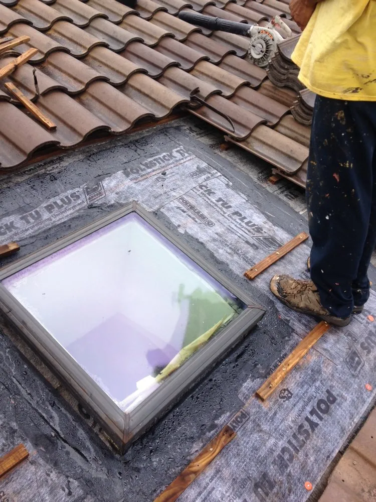 Slide of JVR Roofing