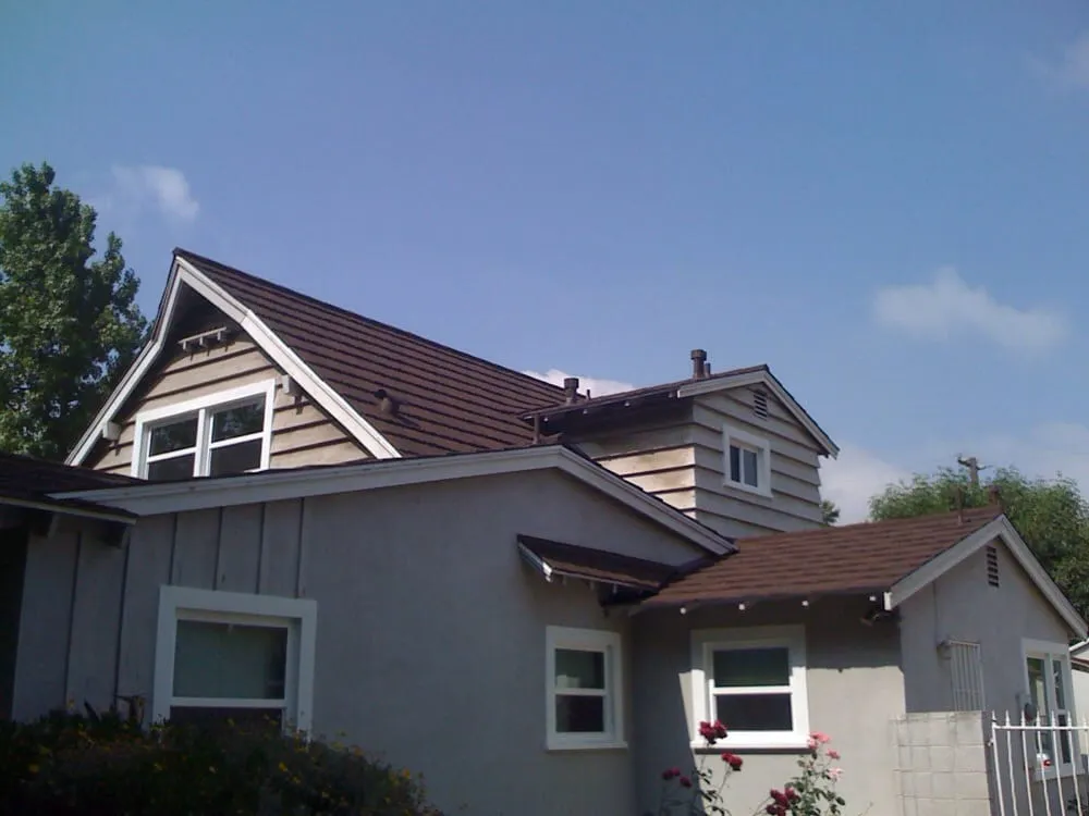 Slide of JW Roofing Services