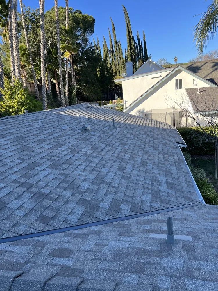 Slide of JW Roofing Services