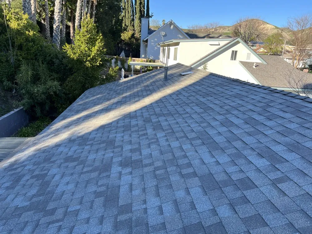 Slide of JW Roofing Services