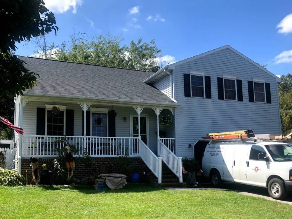 Slide of JWE Remodeling and Roofing