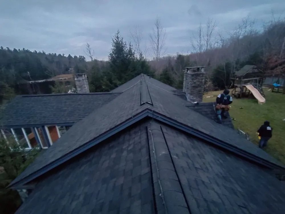 Slide of J&Z Roofing Construction