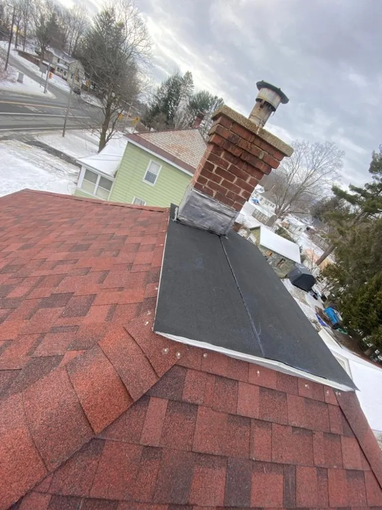 Slide of J&Z Roofing Construction