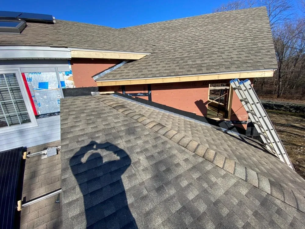 Slide of J&Z Roofing Construction