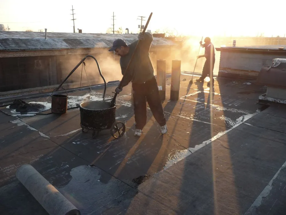 Slide of JZ Roofing of Chicago