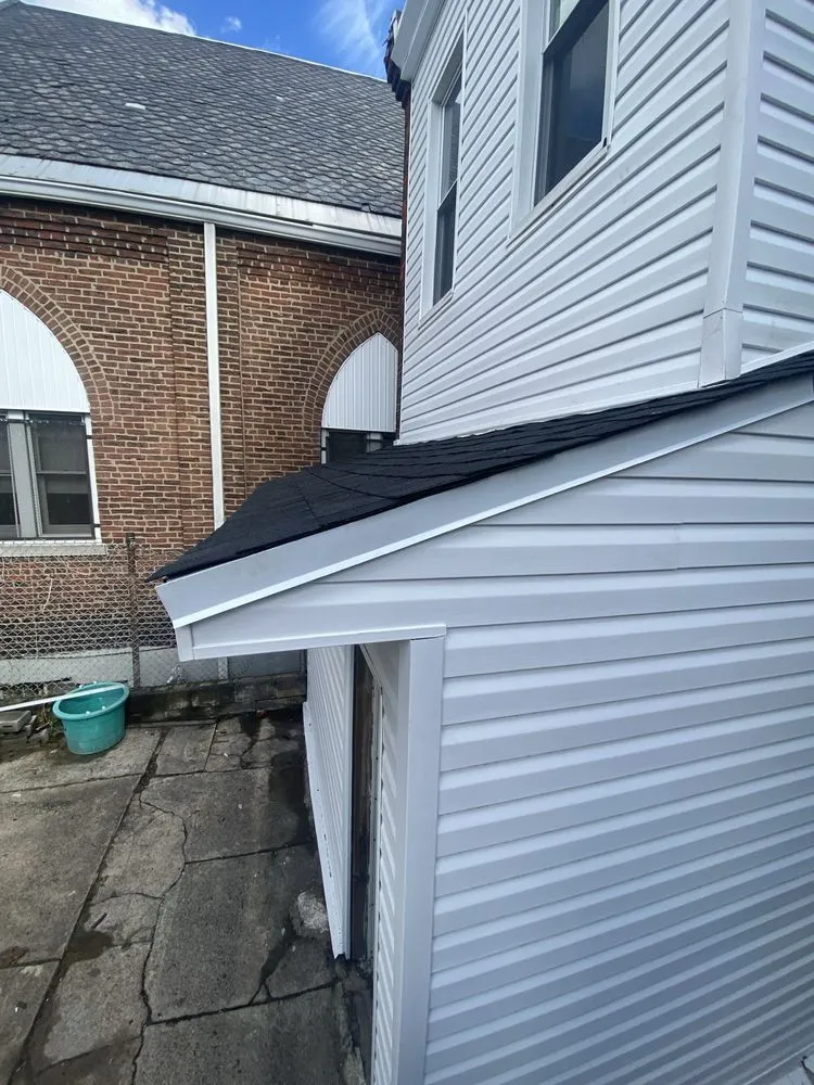 Slide of JZM Roofing and Construction