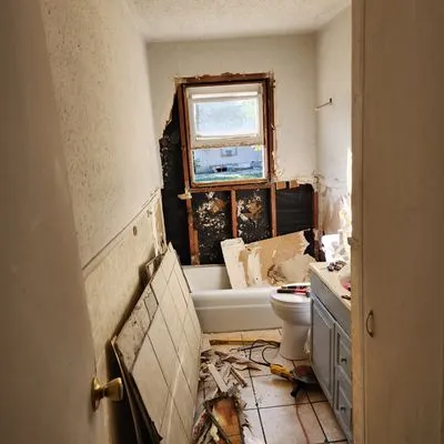 K & A Construction Logo