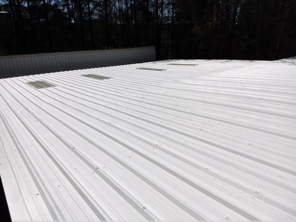 Slide of K & C Seamless Roofing