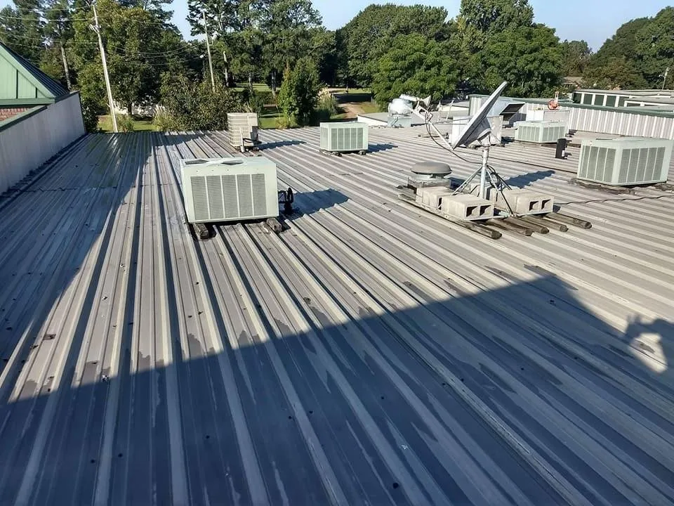 Slide of K & C Seamless Roofing