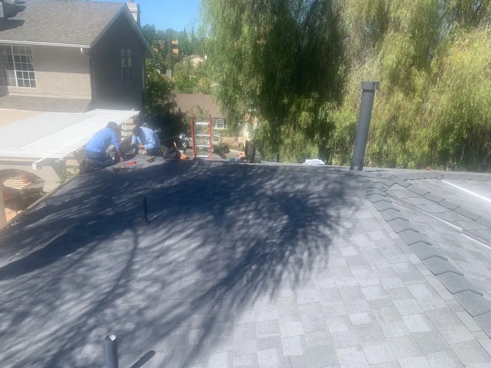 Slide of K & H Roofing