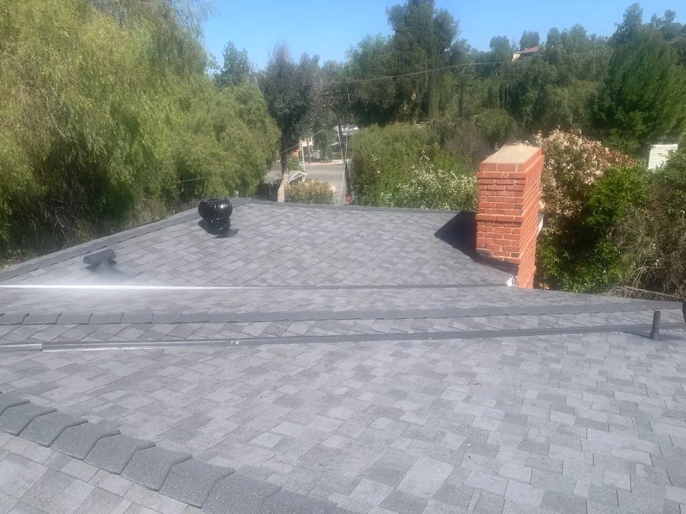 Slide of K & H Roofing