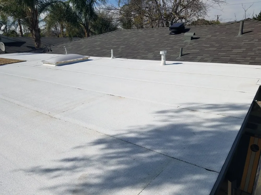 Slide of K & H Roofing