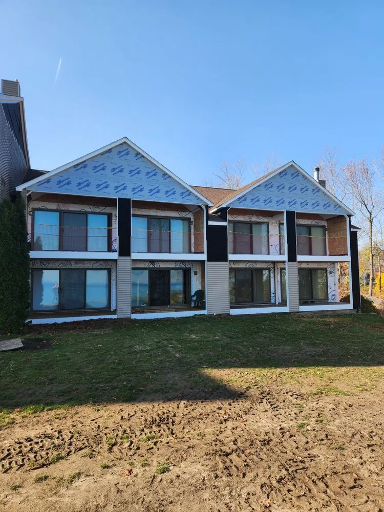 Emergency flat roof repair in Snover, MI by K & M Home Improvements