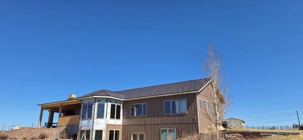 Slide of K & M Roof and Metal Works