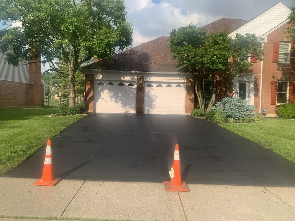 Slide of K & M Roofing and Sealcoating