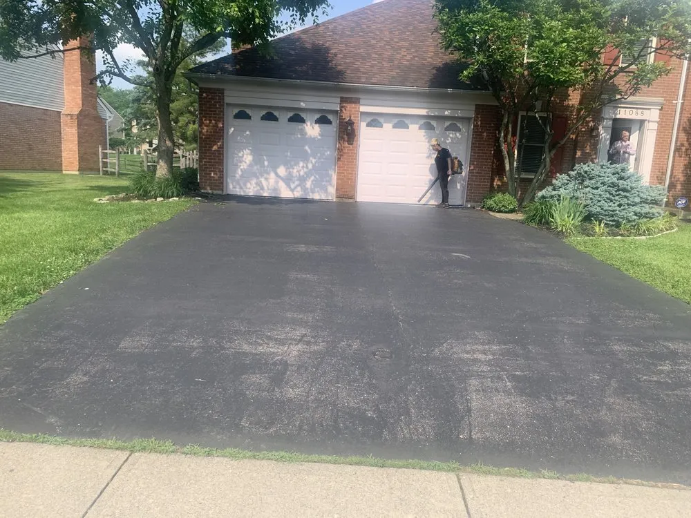 Slide of K & M Roofing and Sealcoating