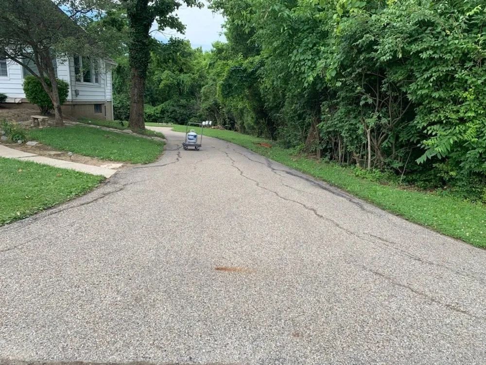 Slide of K & M Roofing and Sealcoating