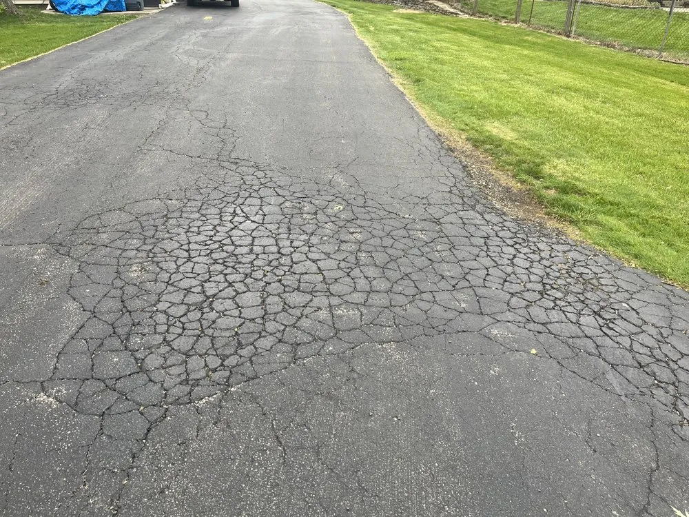 Slide of K & M Roofing and Sealcoating