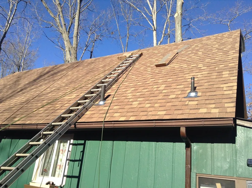 Slide of K & M Roofing Company