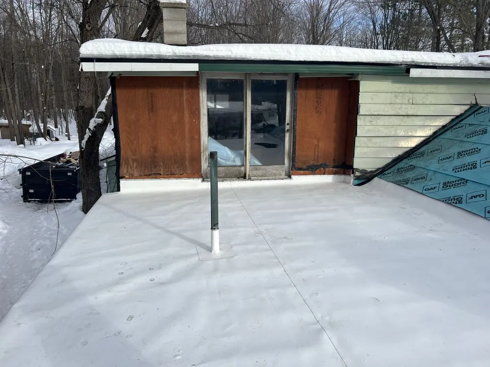 Slide of K & M Roofing