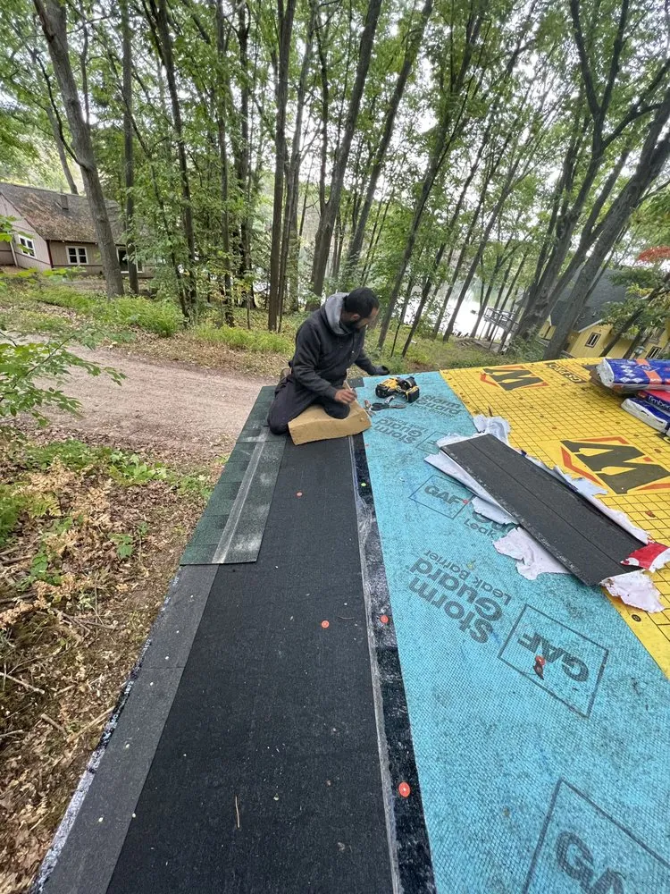 Slide of K & M Roofing