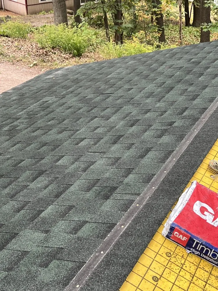 Slide of K & M Roofing