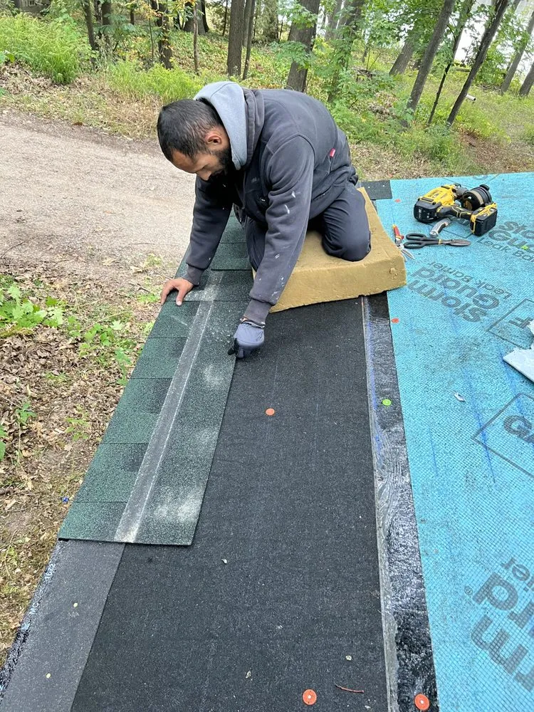 Slide of K & M Roofing